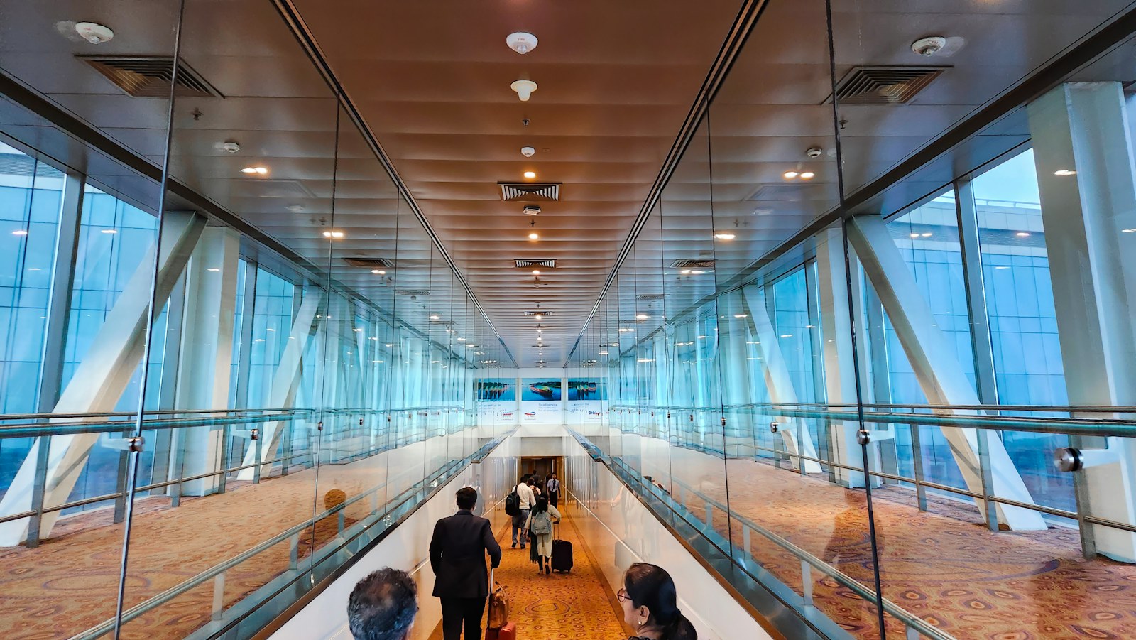 A group of people riding on a boat inside of a building
