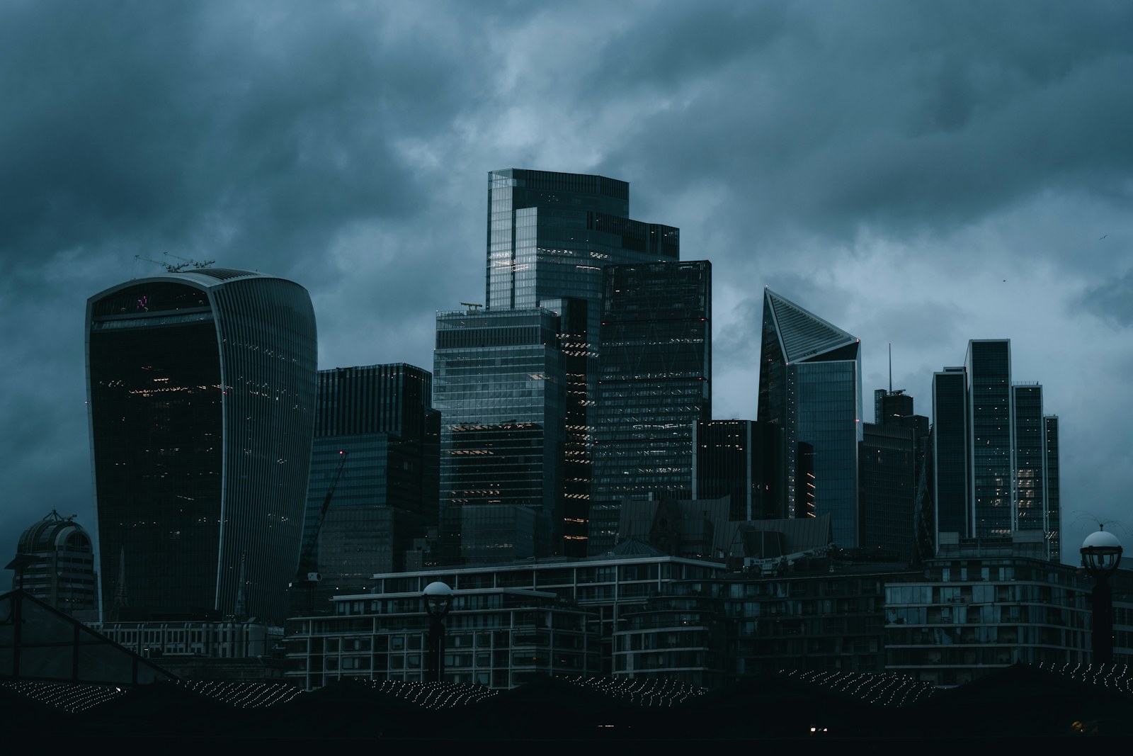 Modern skyscrapers under a cloudy sky
