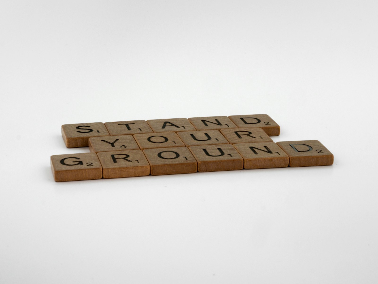 a couple of scrabbles that are sitting on a table