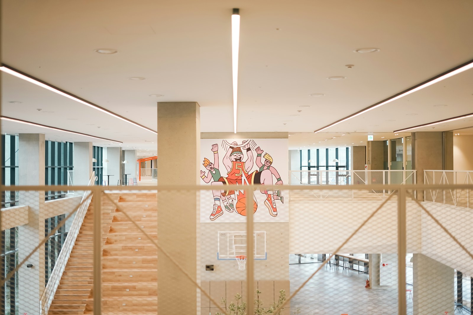 a view of a basketball court from inside a building