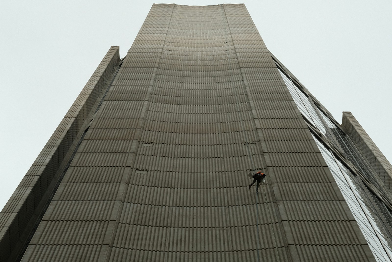 A tall building with a sky background