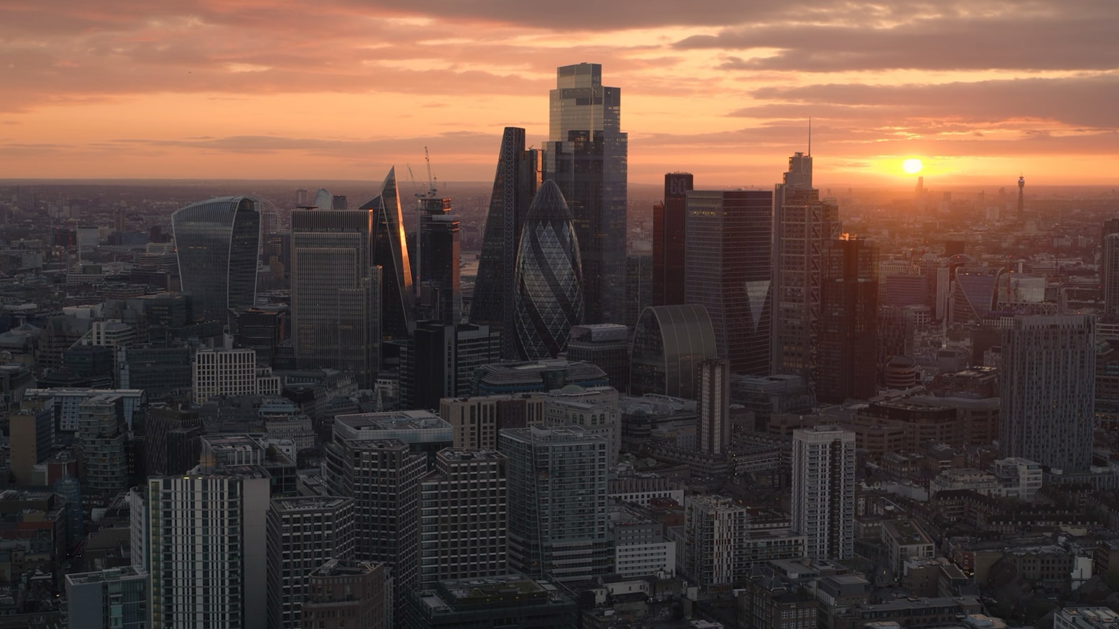 City skyline at sunset with modern architecture