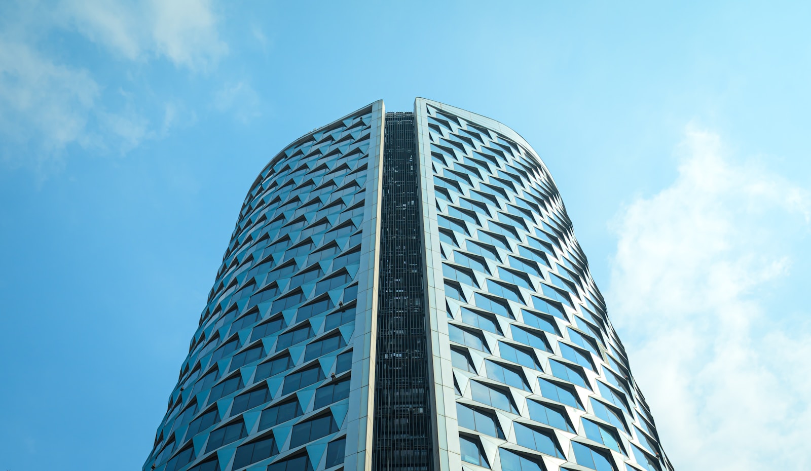 A very tall building with a sky background