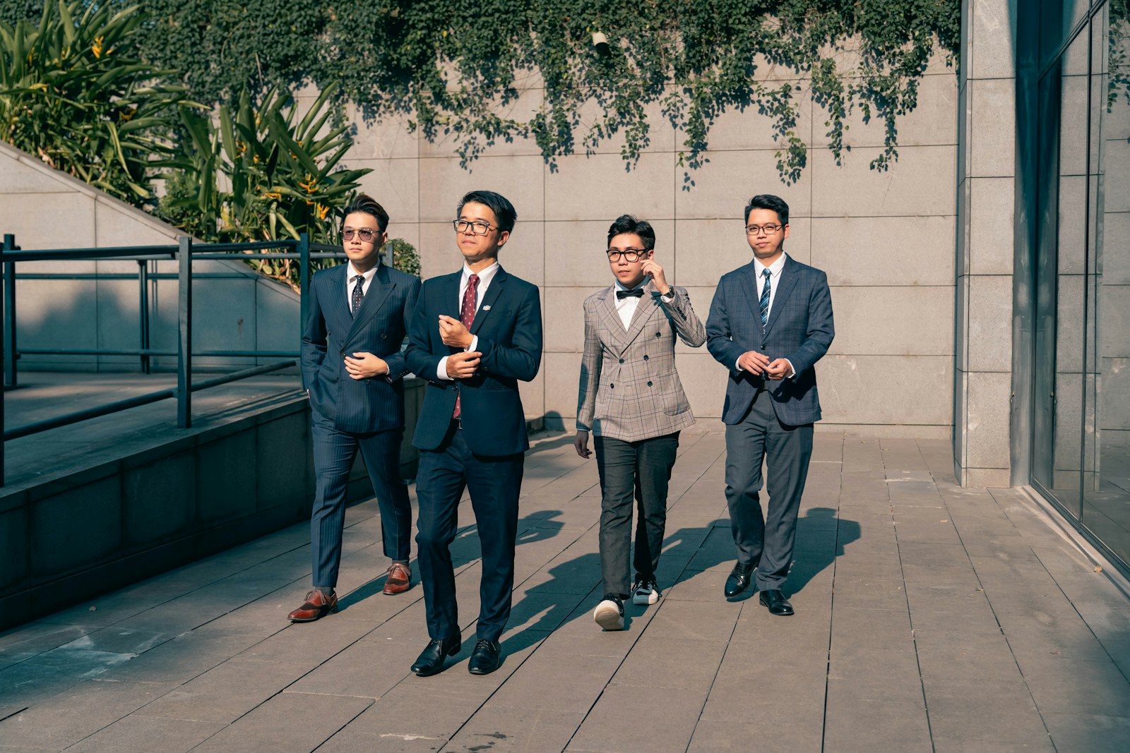 a group of men standing on a bridge