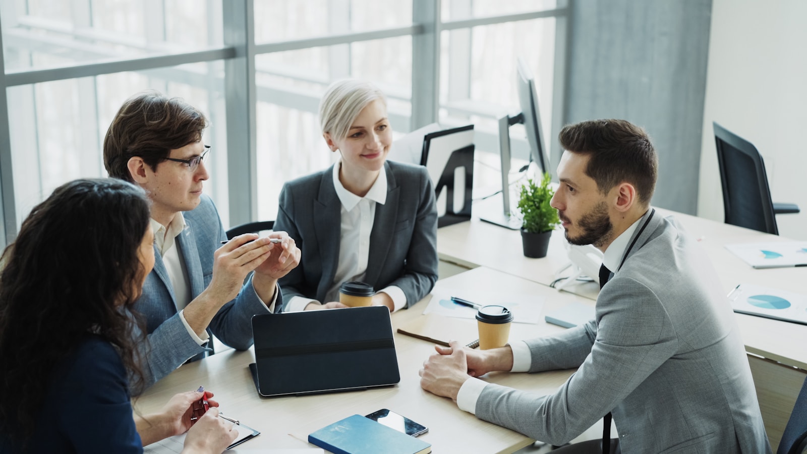 Diverse business team collaborating in a modern office