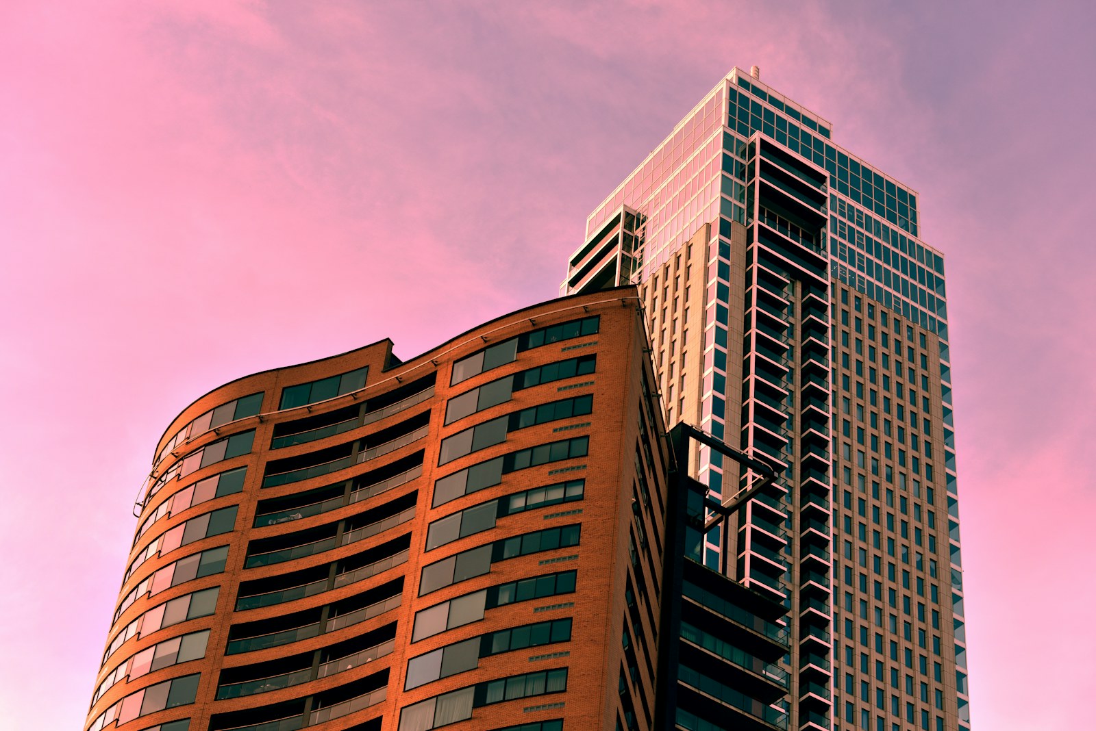 a tall building with a street light in front of it