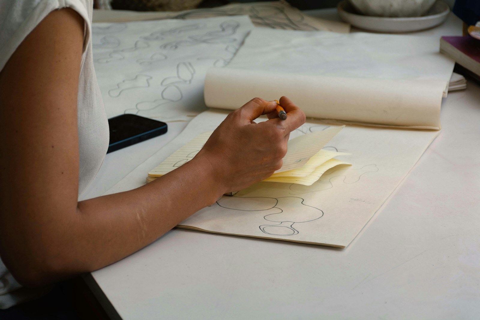 Hand tracing patterns on paper