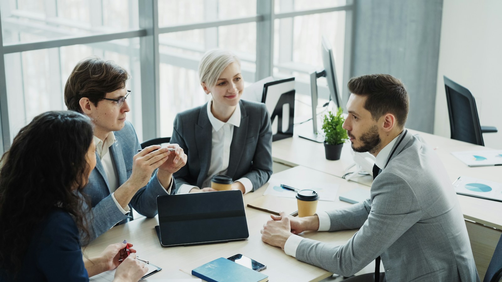 Diverse business team collaborating in a modern office