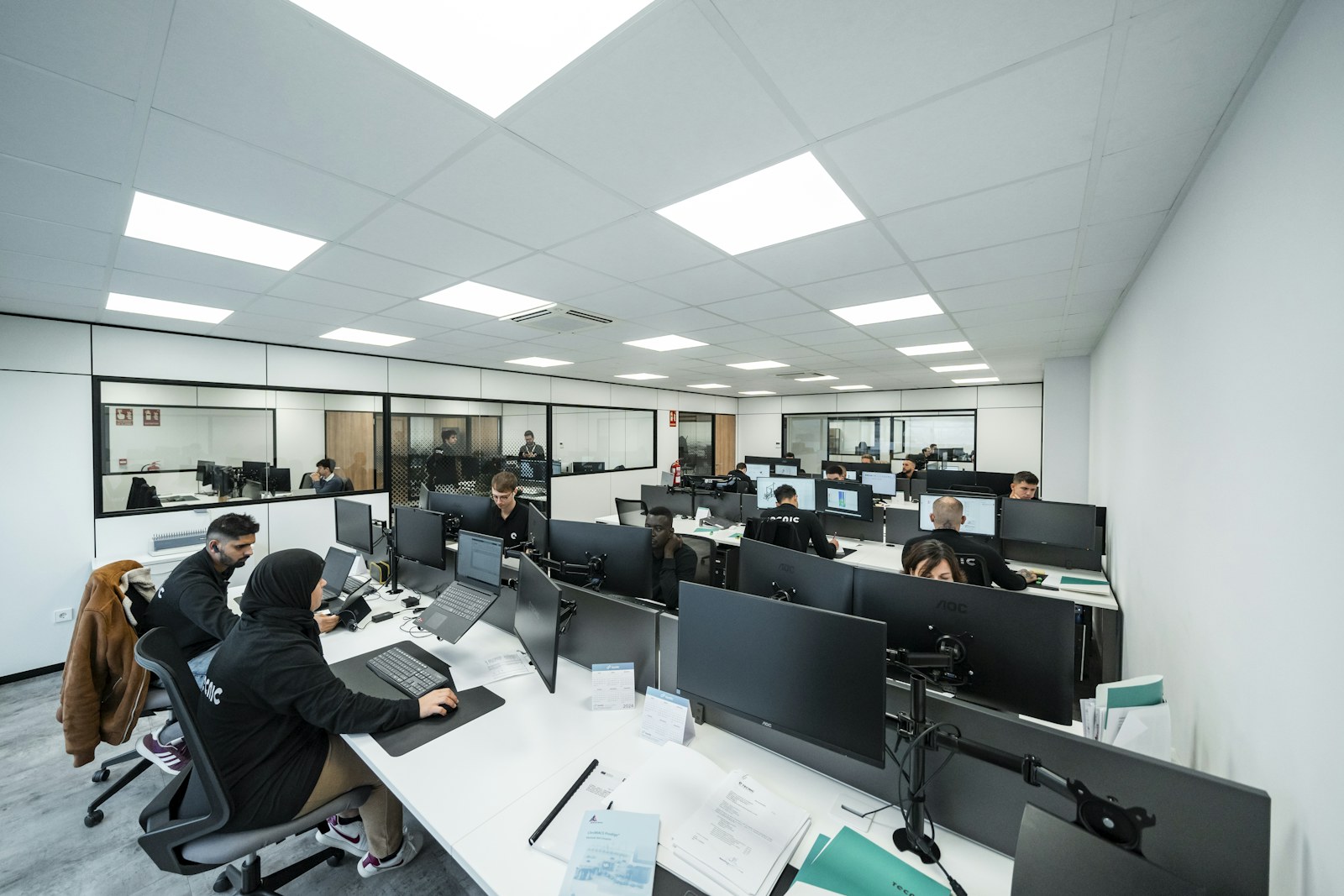 Office workers are busy working on computers