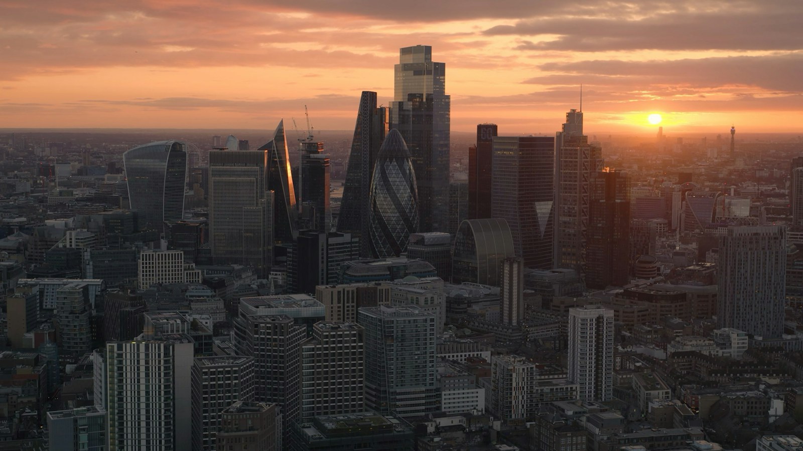 City skyline at sunset with modern architecture