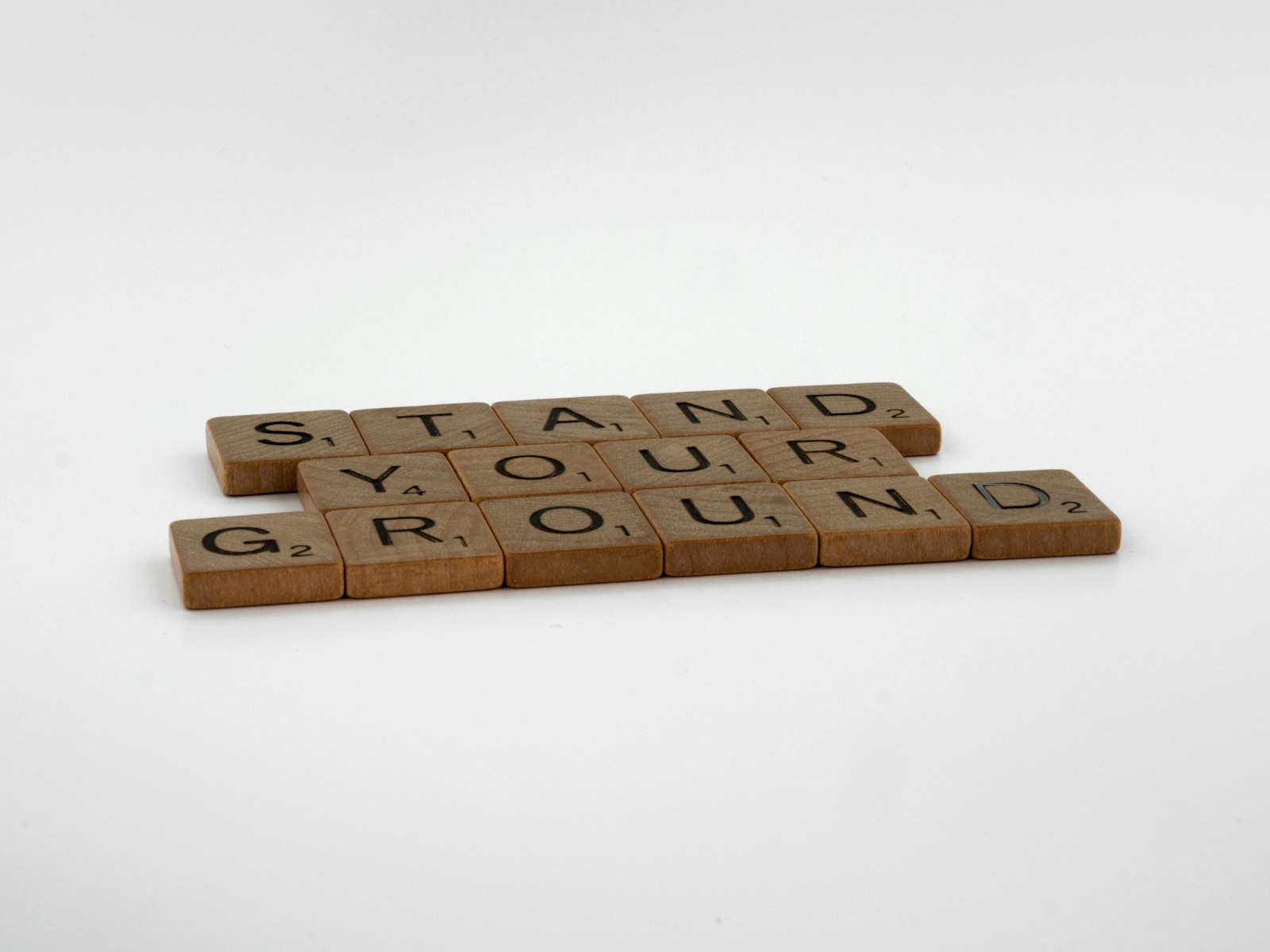 a couple of scrabbles that are sitting on a table