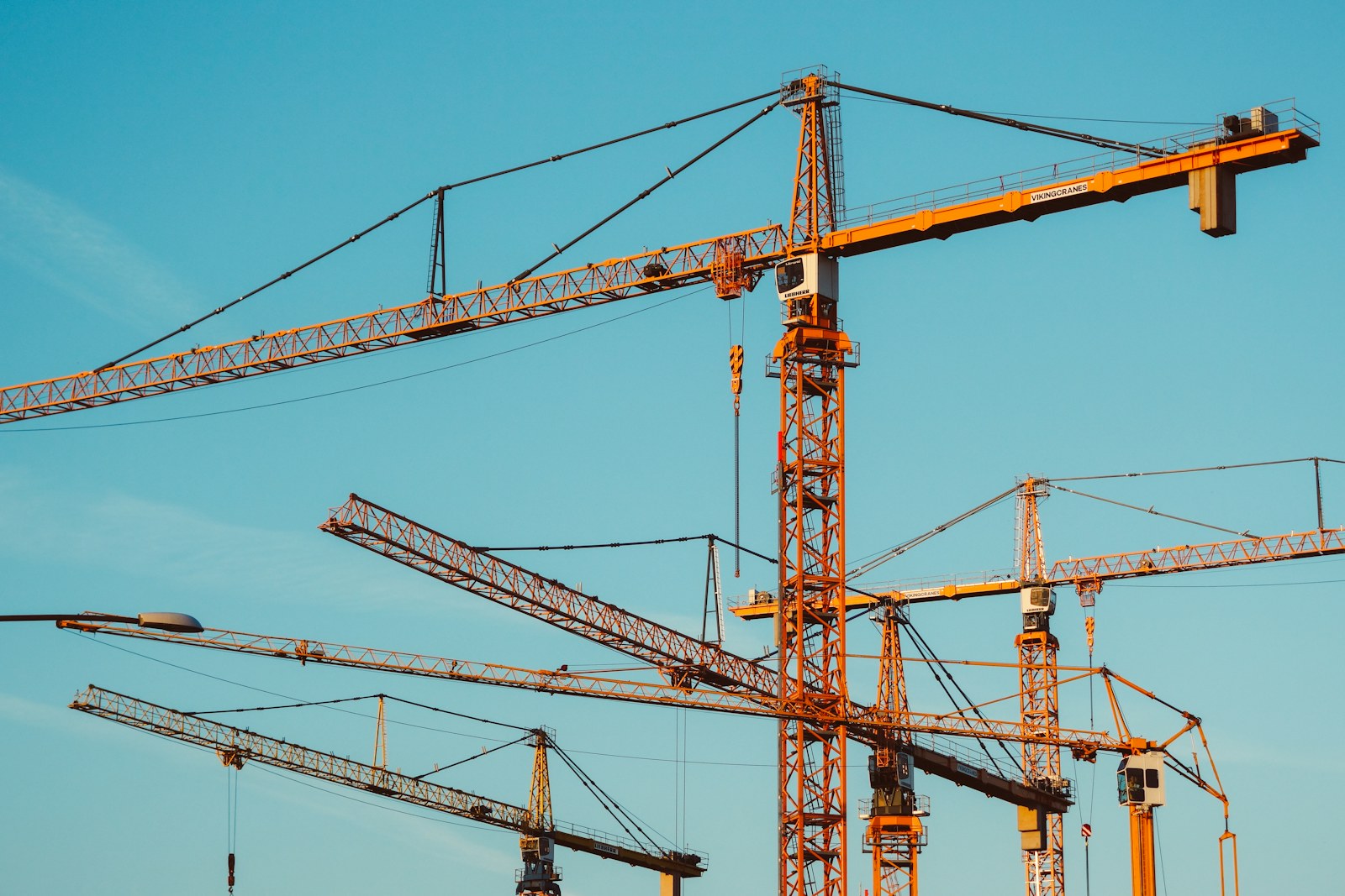 brown tower cranes