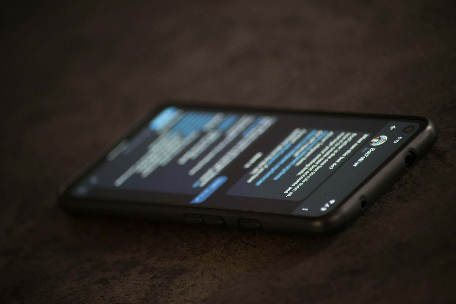 a close up of a cell phone on a table