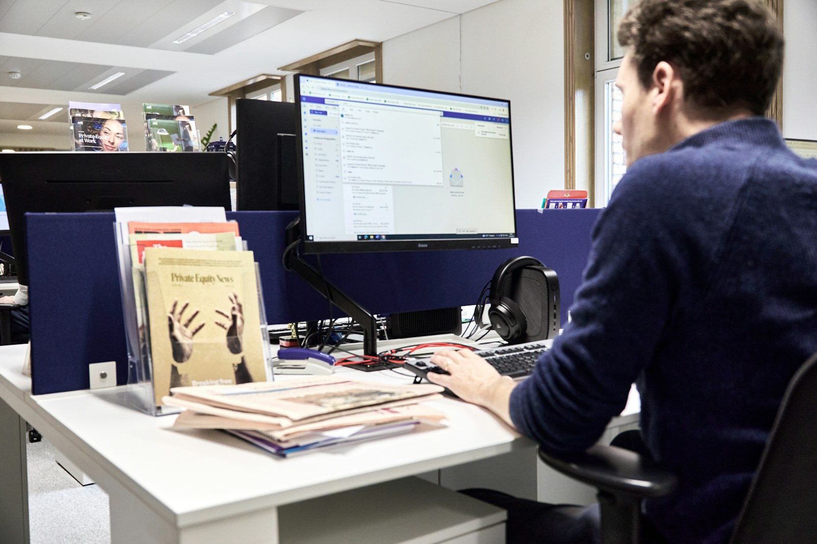 Man working at a computer in an office
