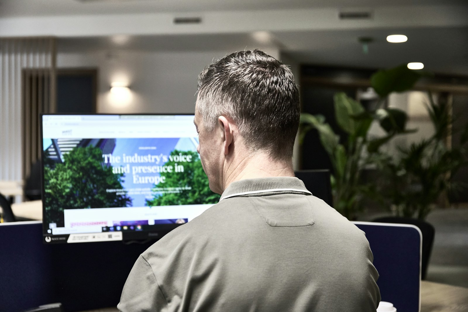 Man working on a computer in an office
