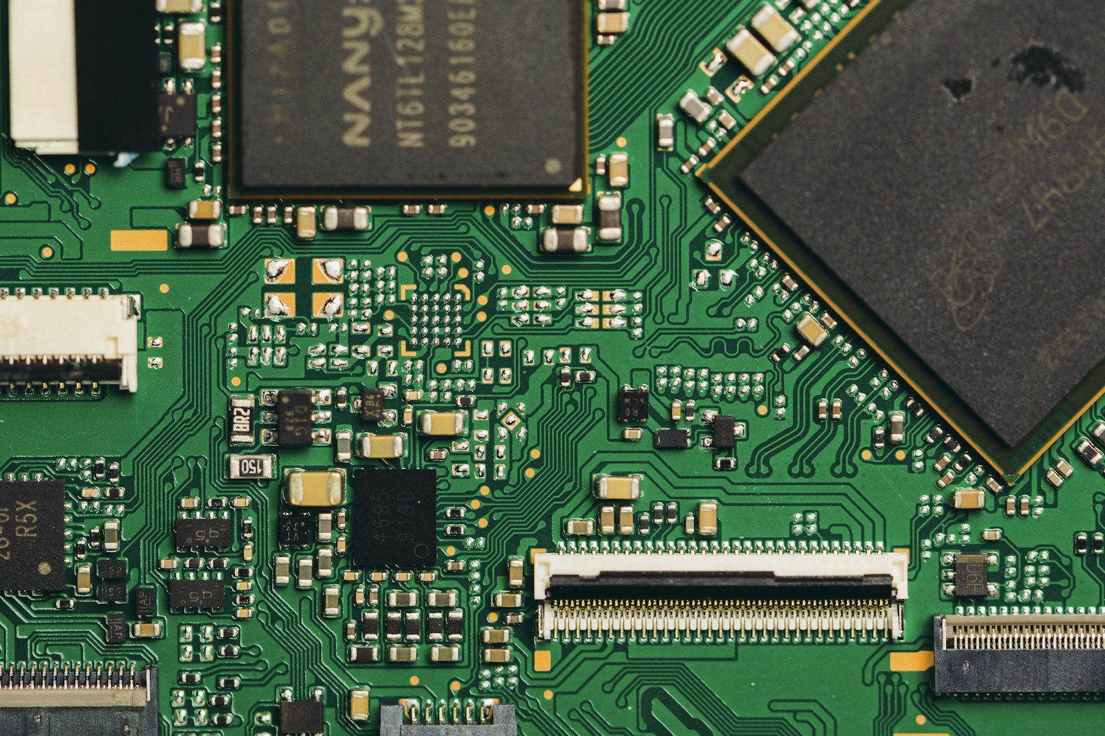 Close-up view of a green circuit board with components