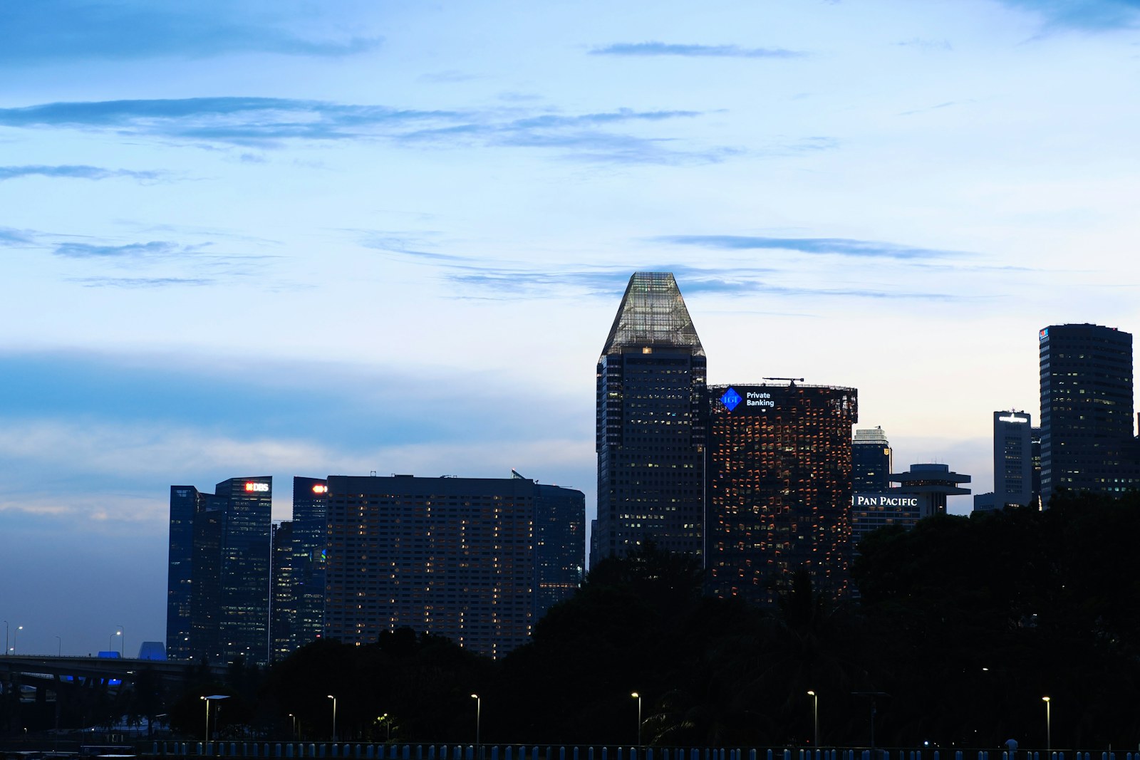City skyline with modern skyscrapers at dusk